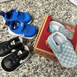 2 pairs of Nike shoes size 2c and 1 pair of blue vans shoes size 3c